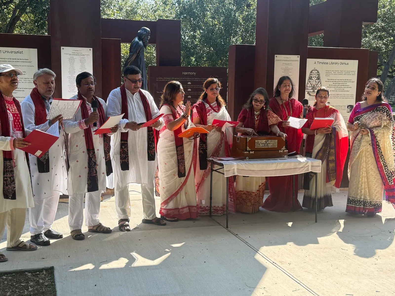 Community gathering beside the memorial â An Inspiring Conversation with Dr. Rabindra Chakraborty