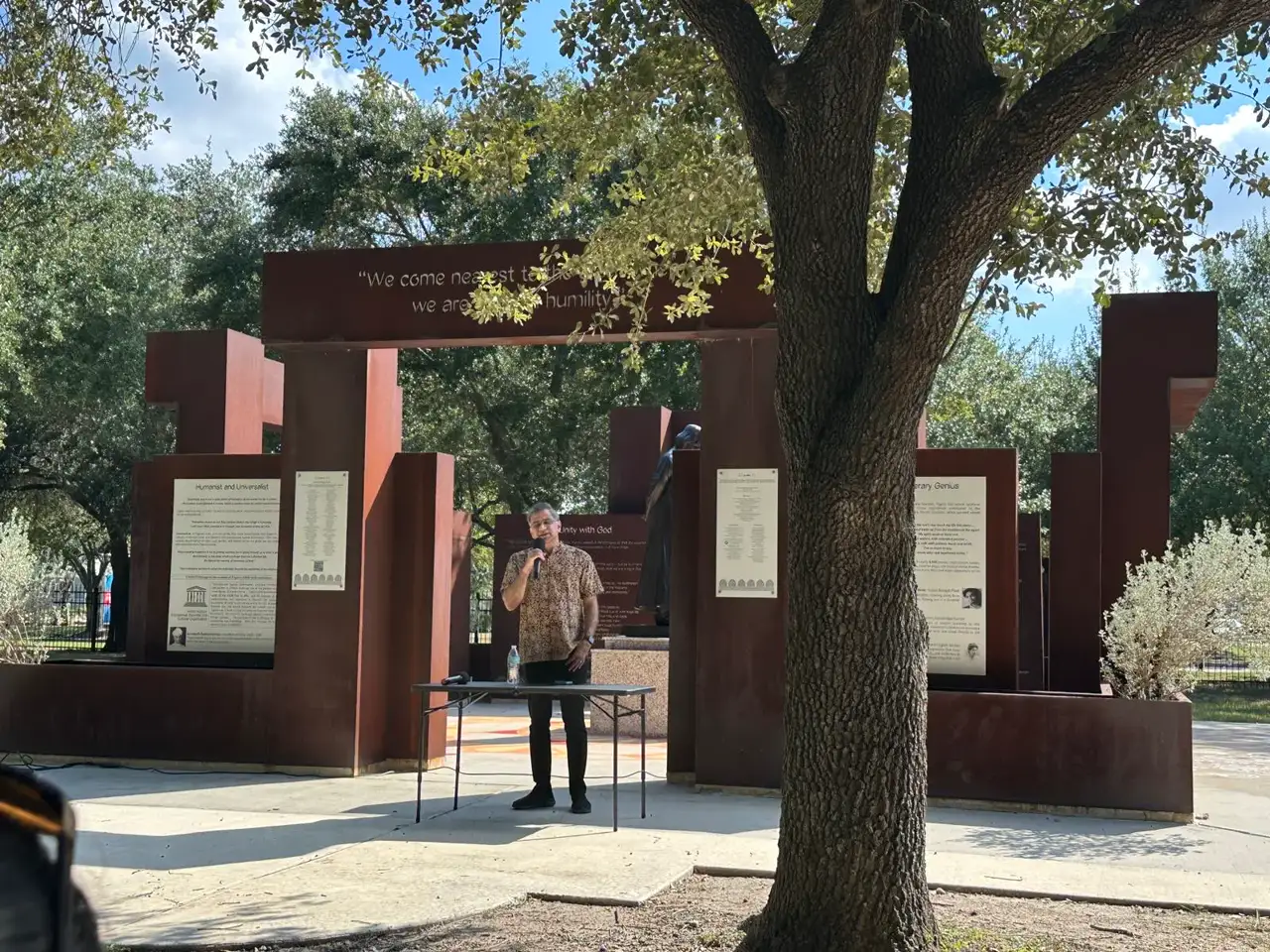 Guest speaking in front of the memorial â An Inspiring Conversation with Dr. Rabindra Chakraborty