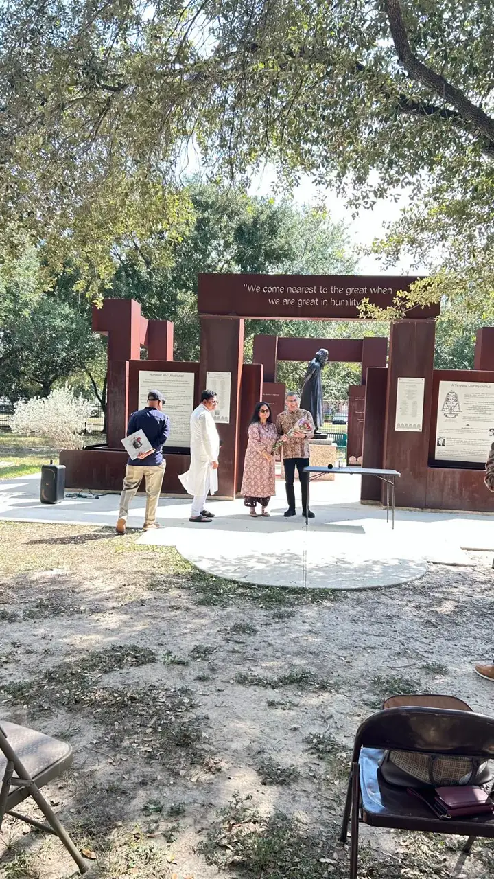 View of the gathering under the trees â An Inspiring Conversation with Dr. Rabindra Chakraborty